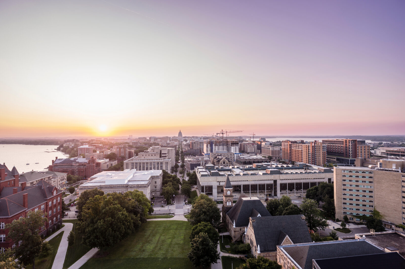 The Madison skyline and state capitol building are seen from a drone at the University of Wisconsin–Madison